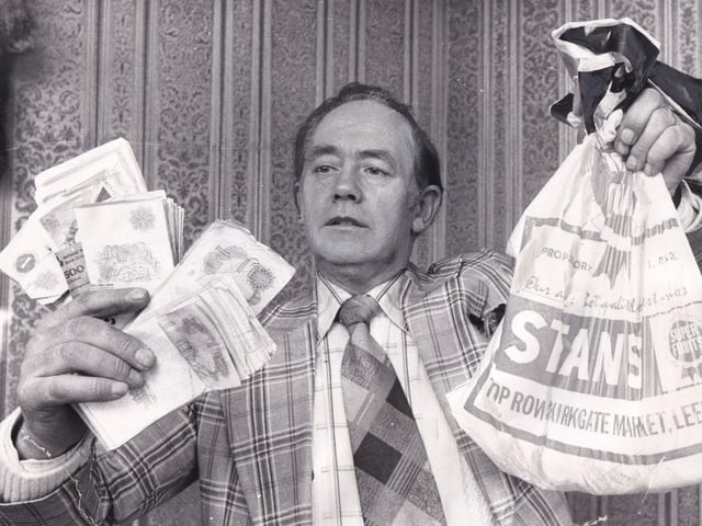 This is fruiterer Stanley Atack who went into the burning hall to rescue his day's takings which he immediately offered on loan to other traders who could not manage.