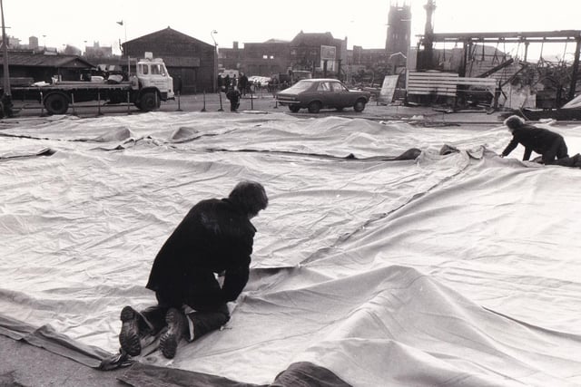 Marquees are put up as temporary accomodation for market traders who were affected by the fire.
