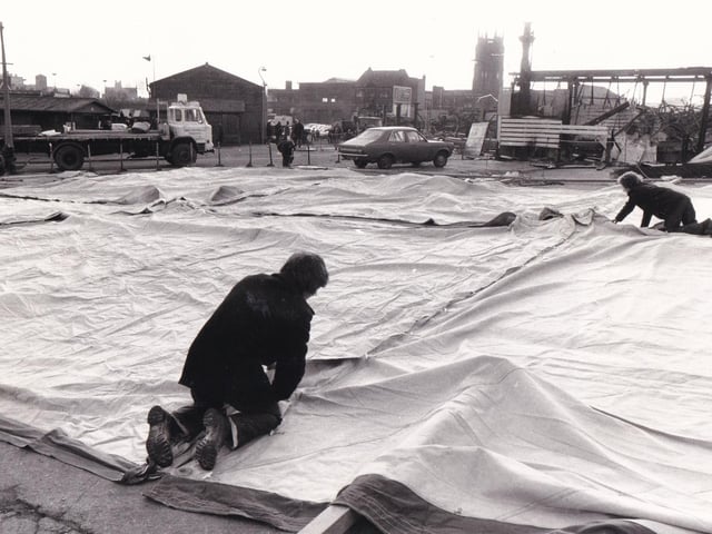Marquees are put up as temporary accomodation for market traders who were affected by the fire.