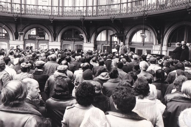 Coun Irwin Bellow, leader of Leeds City Council and Coun William Hudson, chair of the Trading Services Commitee address the traders at an emergency meeting in the Corn Exchange the morning after the fire.