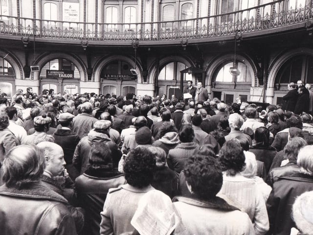 Coun Irwin Bellow, leader of Leeds City Council and Coun William Hudson, chair of the Trading Services Commitee address the traders at an emergency meeting in the Corn Exchange the morning after the fire.