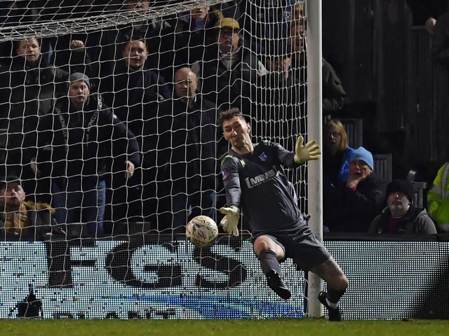 The Irish stopper enjoyed a solid season for Gillingham and beat off stiff competition to make it into this team, chosen by scouts.