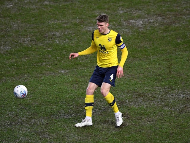 The defender has impressed for Karl Robinson's side this campaign, leading to interest from Fulham, Middlesbrough and Reading.