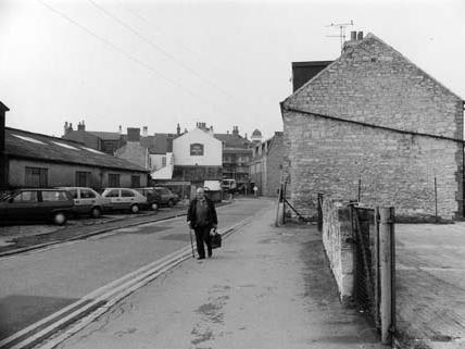 Horsefair looking north-west towards the junction with High Street and North Street. The rear of The Angel pub can be seen in the centre. The entrance to the Horsefair shopping centre is just beyond the building on the right.