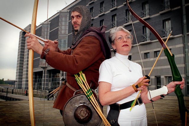 Alan Eyles as an Agincourt archer and Pat Casey as an modern day archer from the Royal Armouries in Leeds whose float theme for this year's parade was 'Healthy, Wealthy and Wise'.