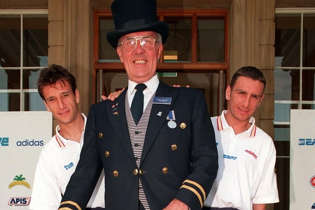 Oulton Hall doorman Gerry Heane with two of the Spanish squad - Alfonso Perez Munoz (left) and Jorge Otero - who were staying at the hotel.