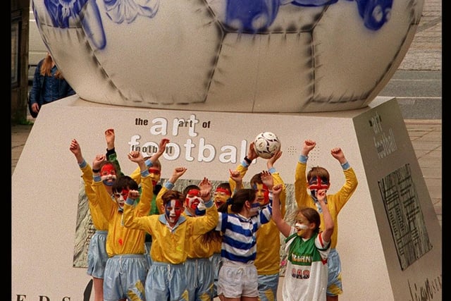 Pupils from St.Mary's, Horsforth, celebrate the launch of The Art of Football', a Leeds City Council arts project for Euro '96 which culminated in a 12 foot giant football in Victoria Gardens.