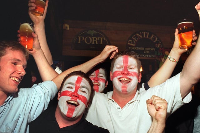 Painted faces celebrate England's opening goal against Germany in the semi-final at Woodies pub, Headingley. Alan Shearer scored by the Three Lions went out on penalties.