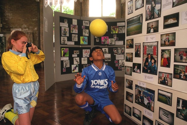 Children's Euro 96 photographic exhibition was  held at The Professional Development Centre on Elmet Lane. Picured are Karen Kelly, from St Mary's Primary and Harkirat Bhambra from Thorner Primary.
