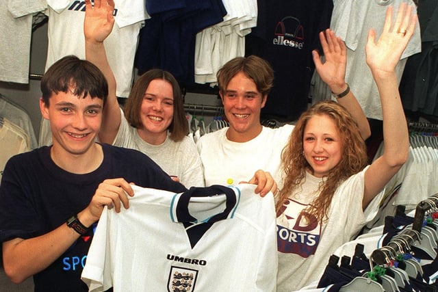 J D Sports in Trinity Street were doing a brisk trade in replica England team strip. Pictured are shop assistants, from left, Karl Fisher, Lisa Cromack, Paul Coates and Tanya McCartan.