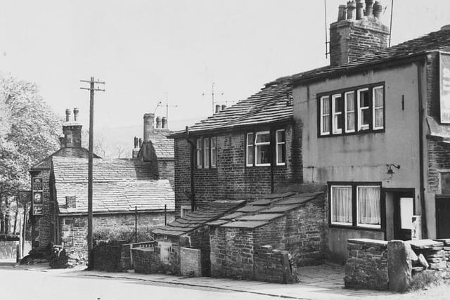 Old cottages and white Swan Inn at Holmfield back in 1970