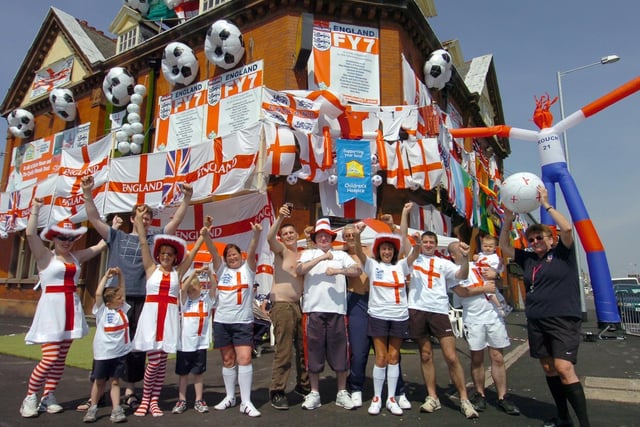 Staff and regulars at the Fleetwod Arms , Dock Street in Fleetwood with their pub decorated for the World Cup