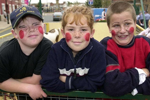 Sean Dobbie (8), Polly Ashworth (9), Chris McKenzie (15) on the Farmer Parrs float, 2000