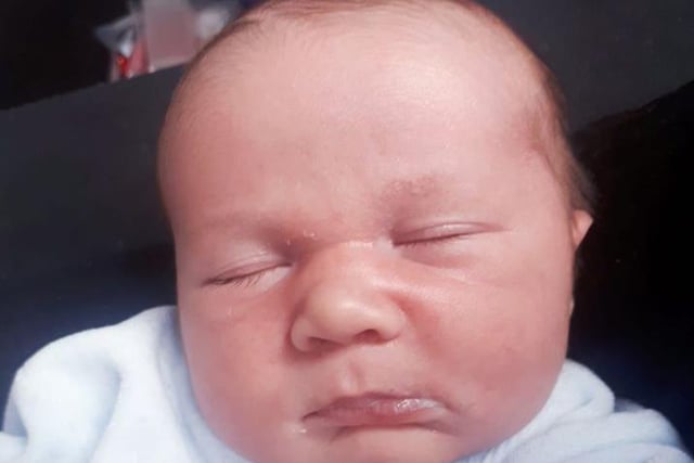 George was born on May 23 and weighed no less than 8lb 8oz to parents Lucy Evans and Darren Johnston from South Shore.