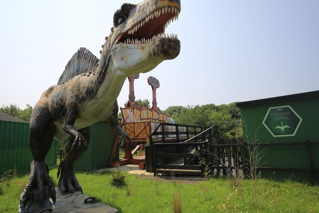 There are ginormous statues of dinosaurs all over the Lost World including rides such as the Pterosaur Turmoil.