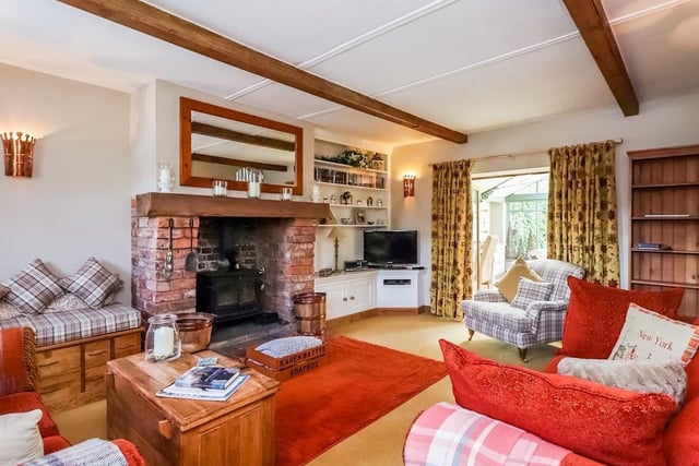 The accommodation comprises of a solid oak staircase, bespoke fitted kitchen/diner with multi-fuel burning stove, utility room with downstairs WC off, cedar framed conservatory, four bedrooms with fitted storage and more.