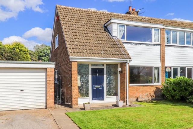 This attractive semi-detached house  includes four bedrooms and two reception rooms, well maintained gardens, off-street parking and a detached single garage.