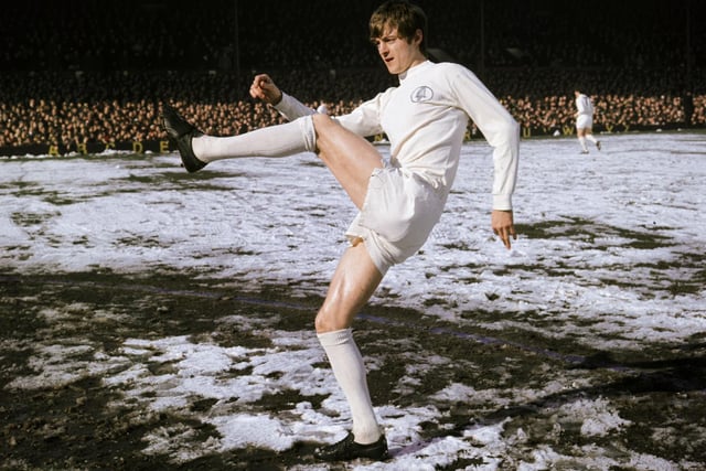 Allan Clarke, of Leeds United, kicking the ball on a snow-covered football pitch in Liverpool in 1970. Picture: Victor Drees/Express/Getty Images.