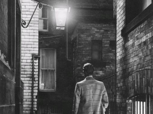 Leeds, 26th August 1970. Gas Light Alley. Burning brightly, the old gas lamp in an alleyway between Albion Place and Commercial Street, Leeds, will soon go out for ever.