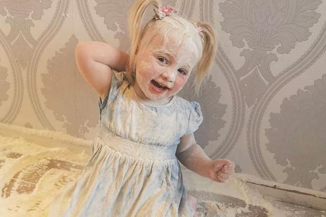 Vicky Makin sent this photo of two-year-old Layla getting into a bag of flour!