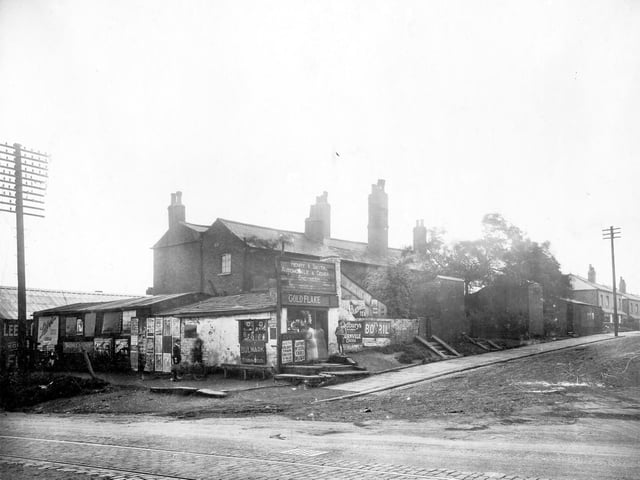 Junction with Osmondthorpe Lane. Shop and garage premises with sign 'Henry.V.Smith, automobile and general engineer.'
