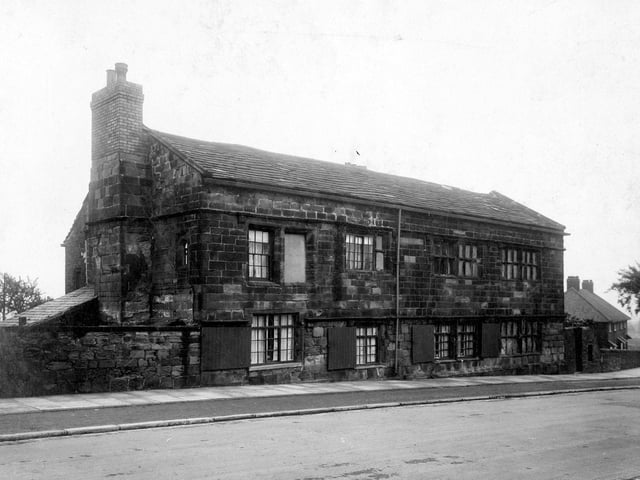 Osmondthorpe Old Hall on the east side of Osmondthorpe Lane showing the front of the property. Houses just below the Hall stand on what was formerly the grounds and is now part of the Rookwood housing estate.