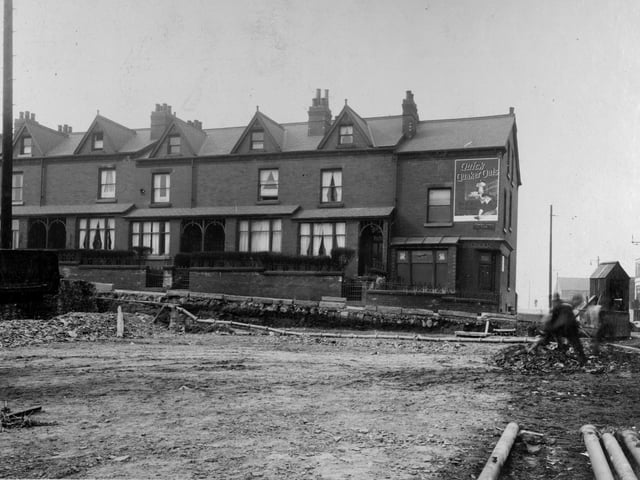 Work in progress on the York Road widening scheme. This view shows the site at the junction with Osmondthorpe Lane, showing sections of sewer pipe and kerb stones.