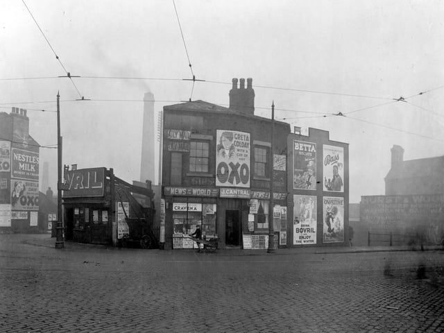 Great Wilson Street at the junction with Neville Street there are two shops, one a grocers and the other a newsagent & tobacconists.