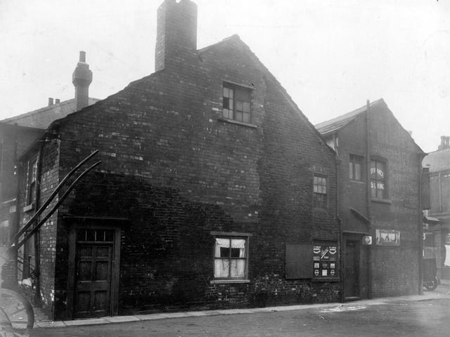 Off Spence Lane, junction with Wortley Lane. Listed as number 3 Wortley Lane and rear of premises in Barratt Fold, G. Clarkson Ltd, chemists.