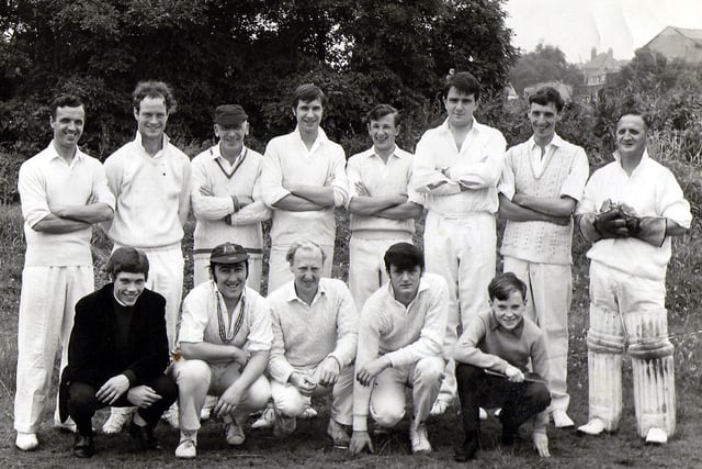 Members of the 'Crabtree Cricket Team' as they pose for a group photograph. They are employees of R.W. Crabtree & Sons Ltd., an engineering firm located in Water Lane.