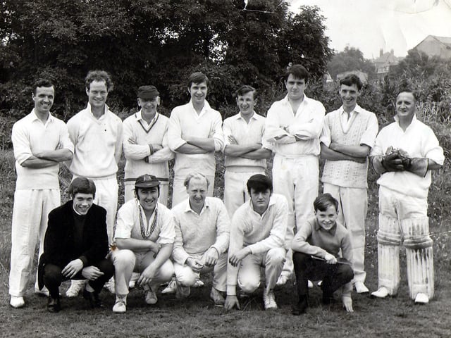 Members of the 'Crabtree Cricket Team' as they pose for a group photograph. They are employees of R.W. Crabtree & Sons Ltd., an engineering firm located in Water Lane.