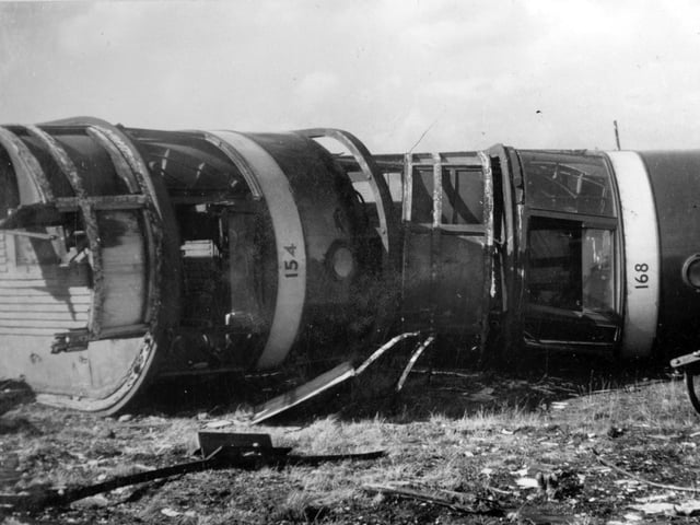 A view showing overturned tram cars at Low Fields Scrapyard.