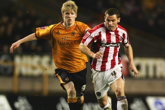 Phil Bardsley and Andy Keogh challenge for the ball during the Championship match between Wolverhampton Wanderers and Sheffield United at Molineux on January 01, 2008 in Wolverhampton, England. (Photo by Matthew Lewis/Getty Images)