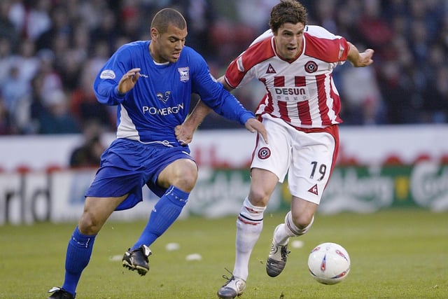 Andy Gray and Jermaine Wright in action during the Nationwide Division One match between Sheffield United and Ipswich Town at Bramell Lane on April 30, 2004 in Sheffield, England. (Photo by Gary M.Prior/Getty Images)
