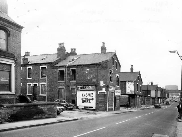Looking north-west along Domestic Street towards railway viaduct. Houses and shops on Willoughby Avenue in the foreground, then Willoughby Grove, Willoughby Place and other Willoughbys, are all boarded up, are due to be demolished.