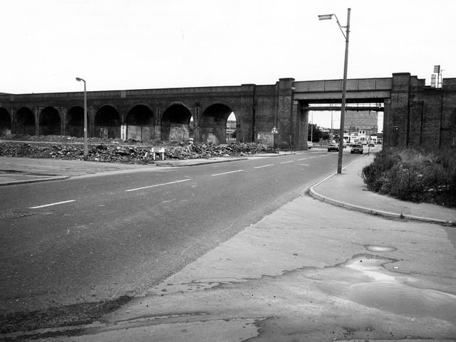 The railway viaduct crossing Domestic Street. The old junction with Ingram Road is on the left, adjacent to an area of wasteground. This area was shortly to be developed as Ingram Gardens and Ingram Close.