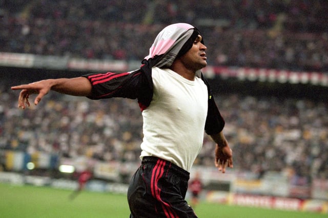 Serginho celebrates scoring the equaliser for AC Milan in the San Siro in the 68th minute.