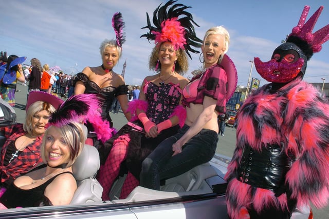 Staff from Drugline Lancashire riding in style in a Mercedes convertible at Pride in 2010