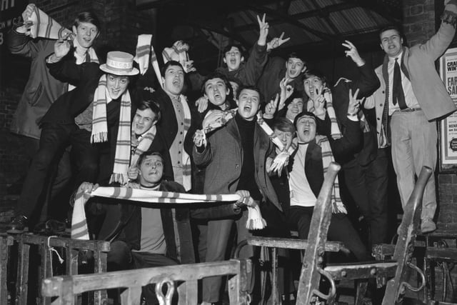 Leeds United fans wait for a train in March 1968. They were on their way to Wembley for the League Cup final against Arsenal. The Whites won 1-0 thanks to a goal from Terry Cooper.