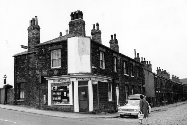 Fountain Street at the junction with Little Fountain Street in Morley. The shop is a tobacconist and confectioners and was owned by M. and M. Knowles.