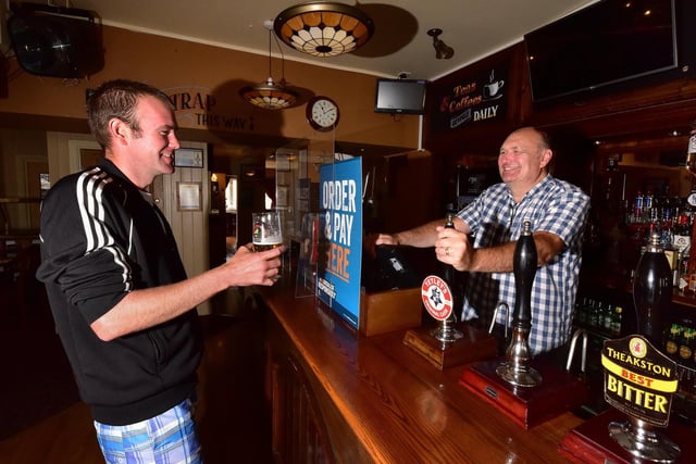 The Albert Pub in North Marine Road opens with Ben Schofield having a pint and Michael Hirst serving.