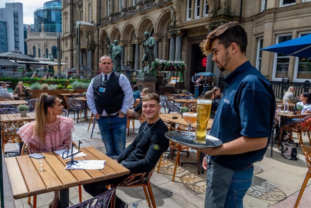 Emily Swain, and Luke Smithurst, of Skipton, been served a drink at Banyan, City Square, Leeds.