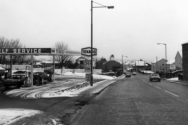 Looking east along Lowtown showing a Texaco self service petrol station on the left.