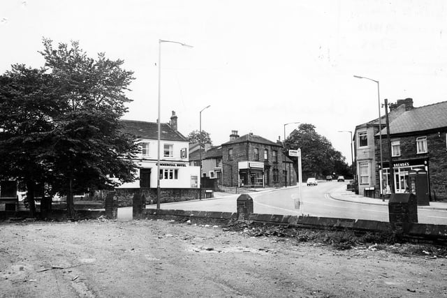 The junction of three roads. Greenside is off to the left and Uppermoor is where the cars are visible. Chapeltown is off to the right.  The Tudor Restaurant is seen centrally.