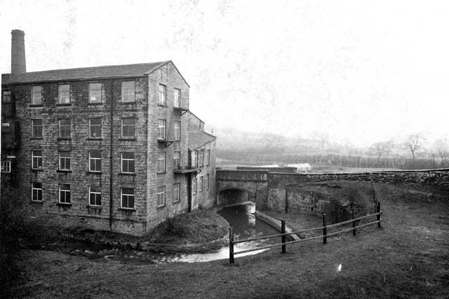 View of Union Mills on Roker Lane with Union Bridge over Pudsey beck on right.