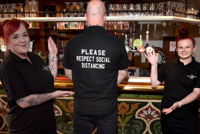 Fiona Campbell, left, and Natasha Keating, right, staff at The Whitesmiths Arms, Standishgate, Wigan.
