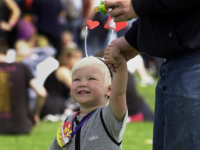 One youngster proves that your never too young to rave at the Love Parade.