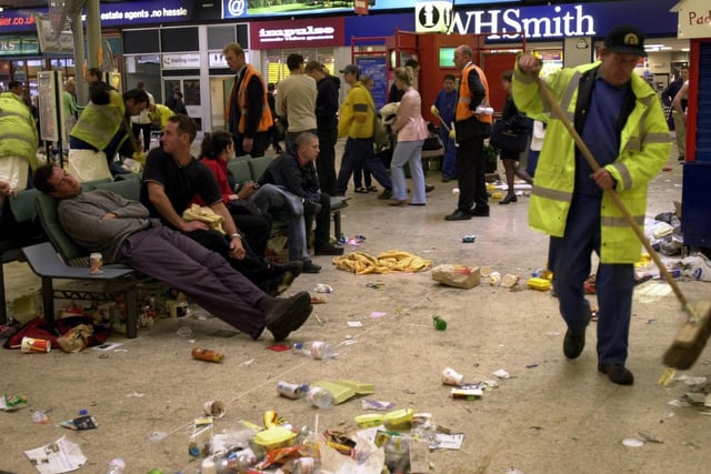 The clear-up operation underway at Leeds City Station on Sunday morning after the Love Parade.