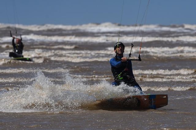 Kiteboarding, also known as kitesurfing, is an action sport combining aspects of wakeboarding, snowboarding, windsurfing, surfing, paragliding, skateboarding and sailing into one extreme sport.