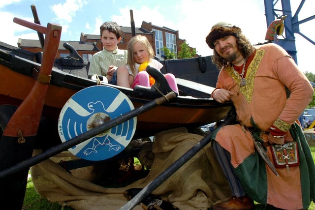 Viking Russ Scott with Thomas and Alice Bryson-Edwards at the Preston Riversway Festival